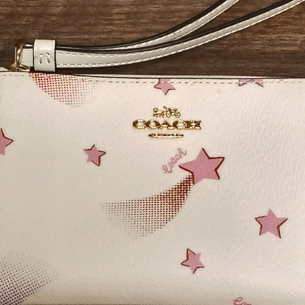 Like New COACH Shooting Stars Logo Zip Wristlet